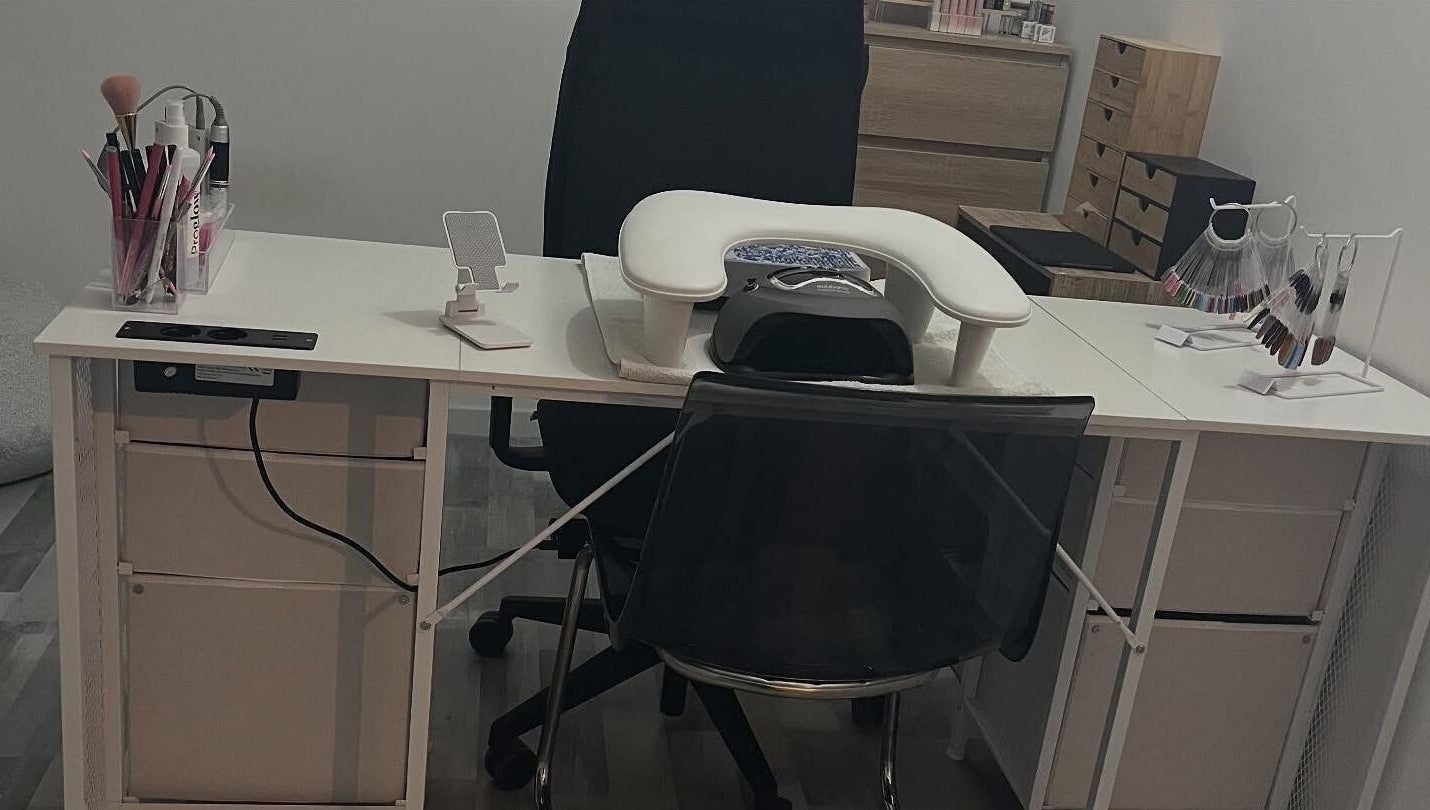 Nail table setup at L’atelier de lala, Berry-au-bac, Hauts-de-france, FR, showcasing manicure essentials.