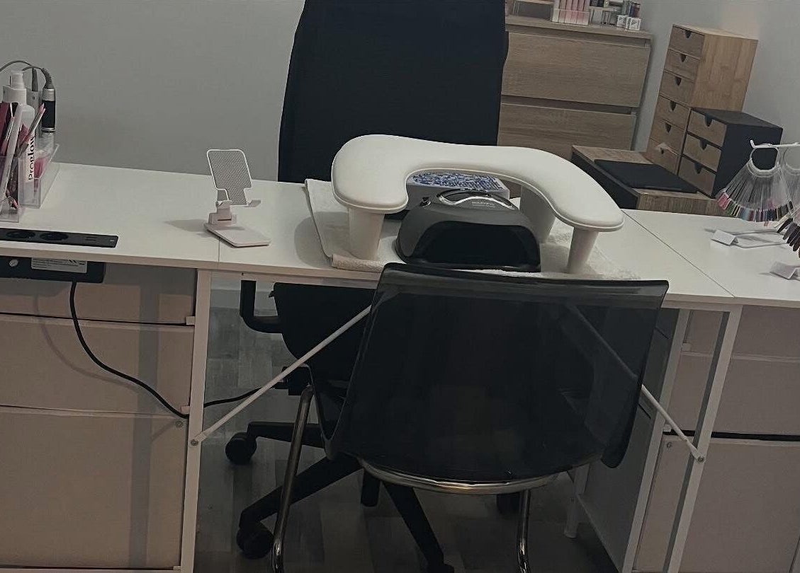 Nail table setup at L’atelier de lala, Berry-au-bac, Hauts-de-france, FR, showcasing manicure essentials.