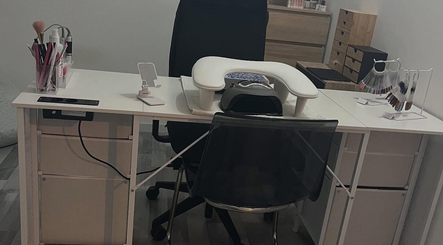 Nail table setup at L’atelier de lala, Berry-au-bac, Hauts-de-france, FR, showcasing manicure essentials.