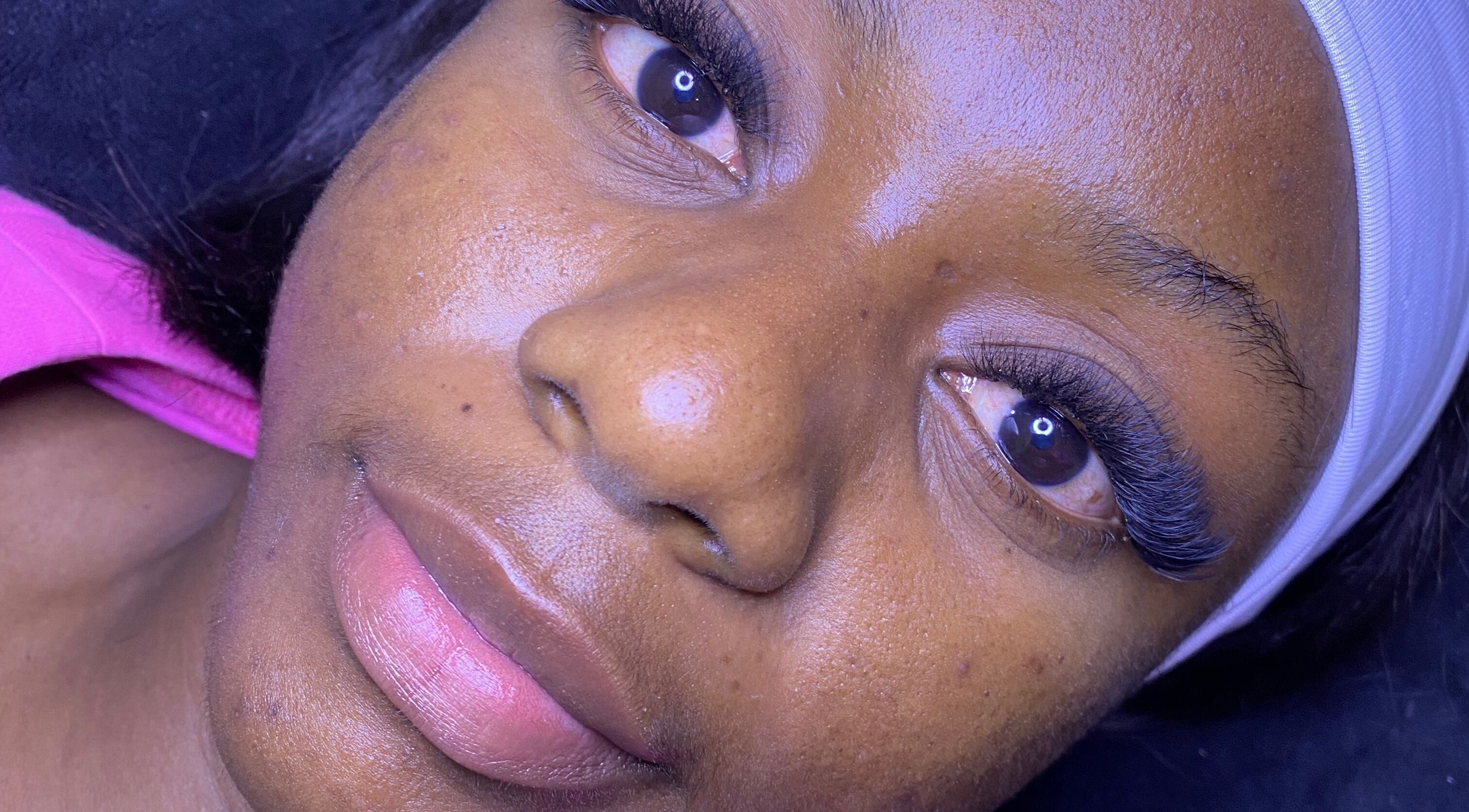 Closeup of a client with expertly applied eyelashes at Flawless Lash Studio, Windhoek, Khomas Region, NA.