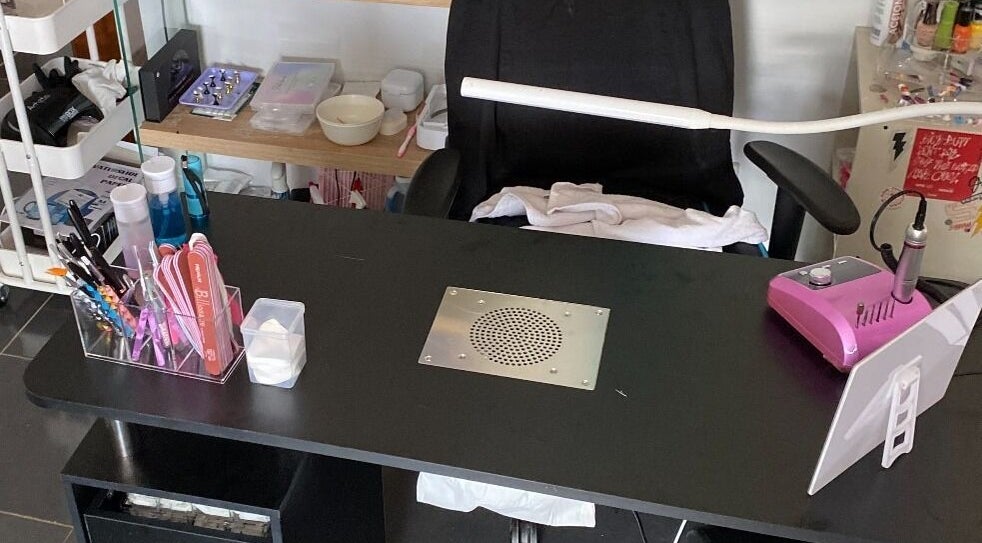 Nail station at Gnarly Nailz in Camira, Queensland, AU with tools and manicure equipment.