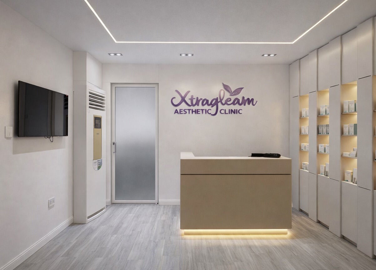 Modern reception at XTRAGLEAM AESTHETIC CLINIC (LAGOS), Agege, Lagos, NG with sleek design and elegant lighting.