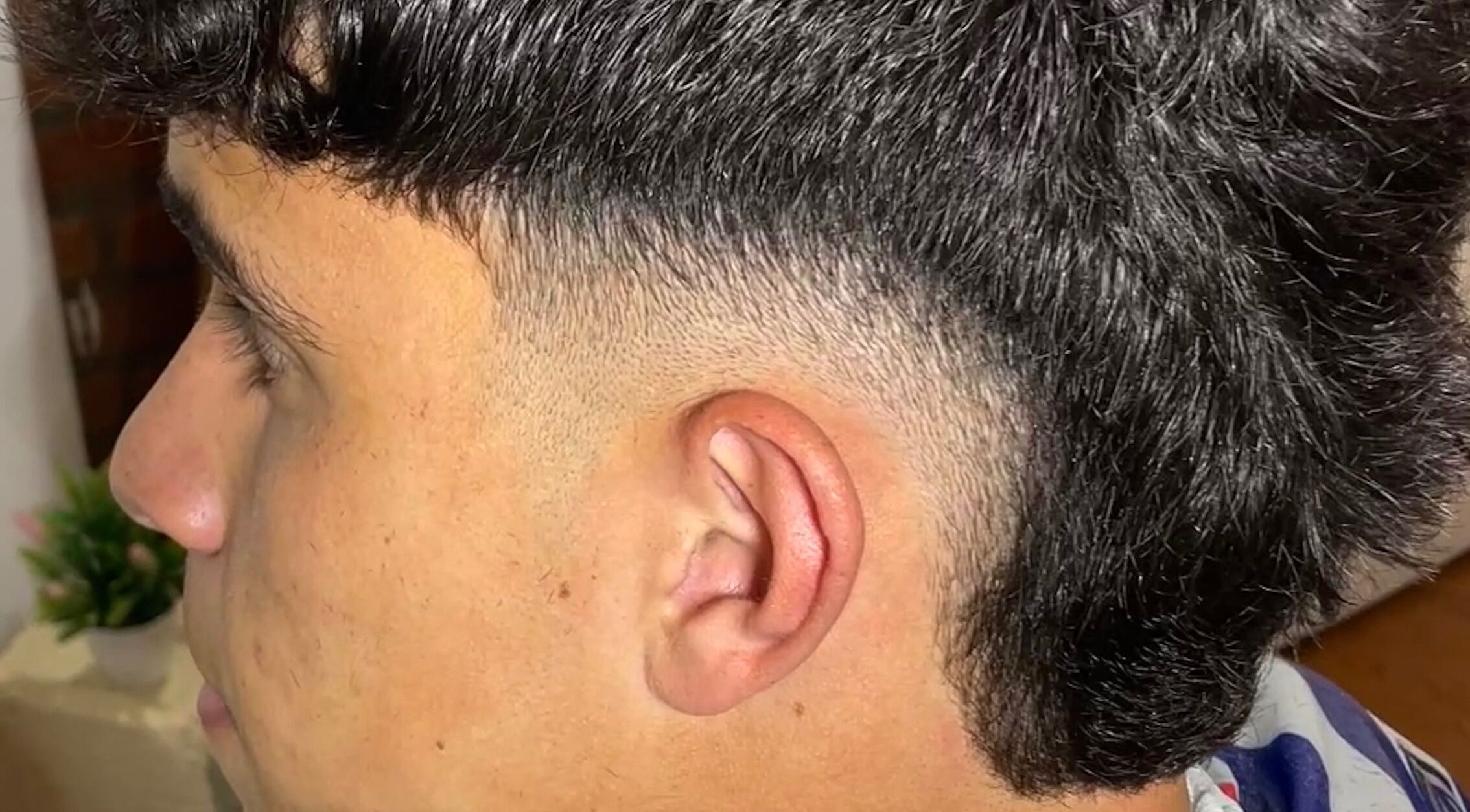 Close-up of a sleek fade haircut at IcebarberStudio, San Luis, San Luis, AR.