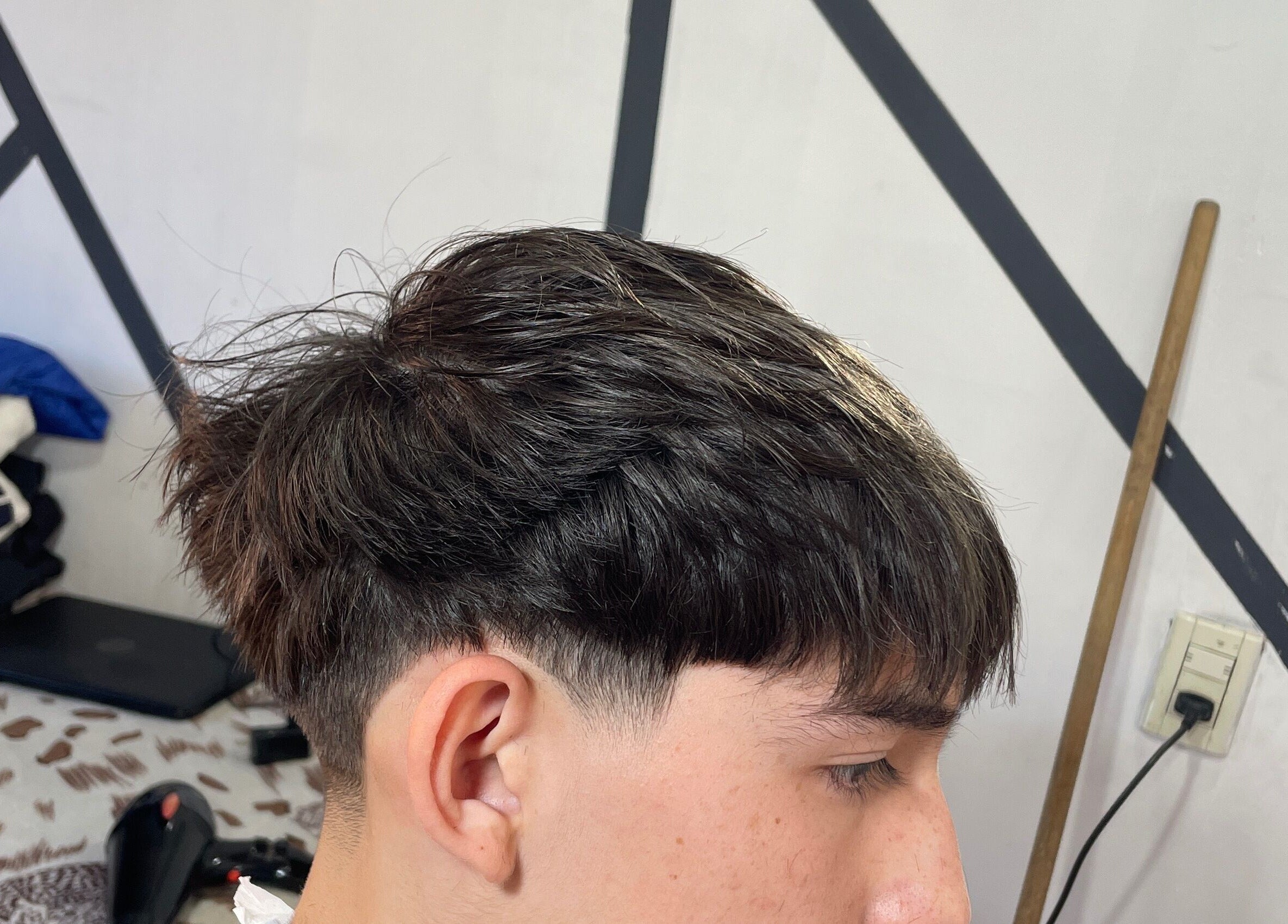 Close-up of fresh haircut at IcebarberStudio in San Luis, San Luis, AR.