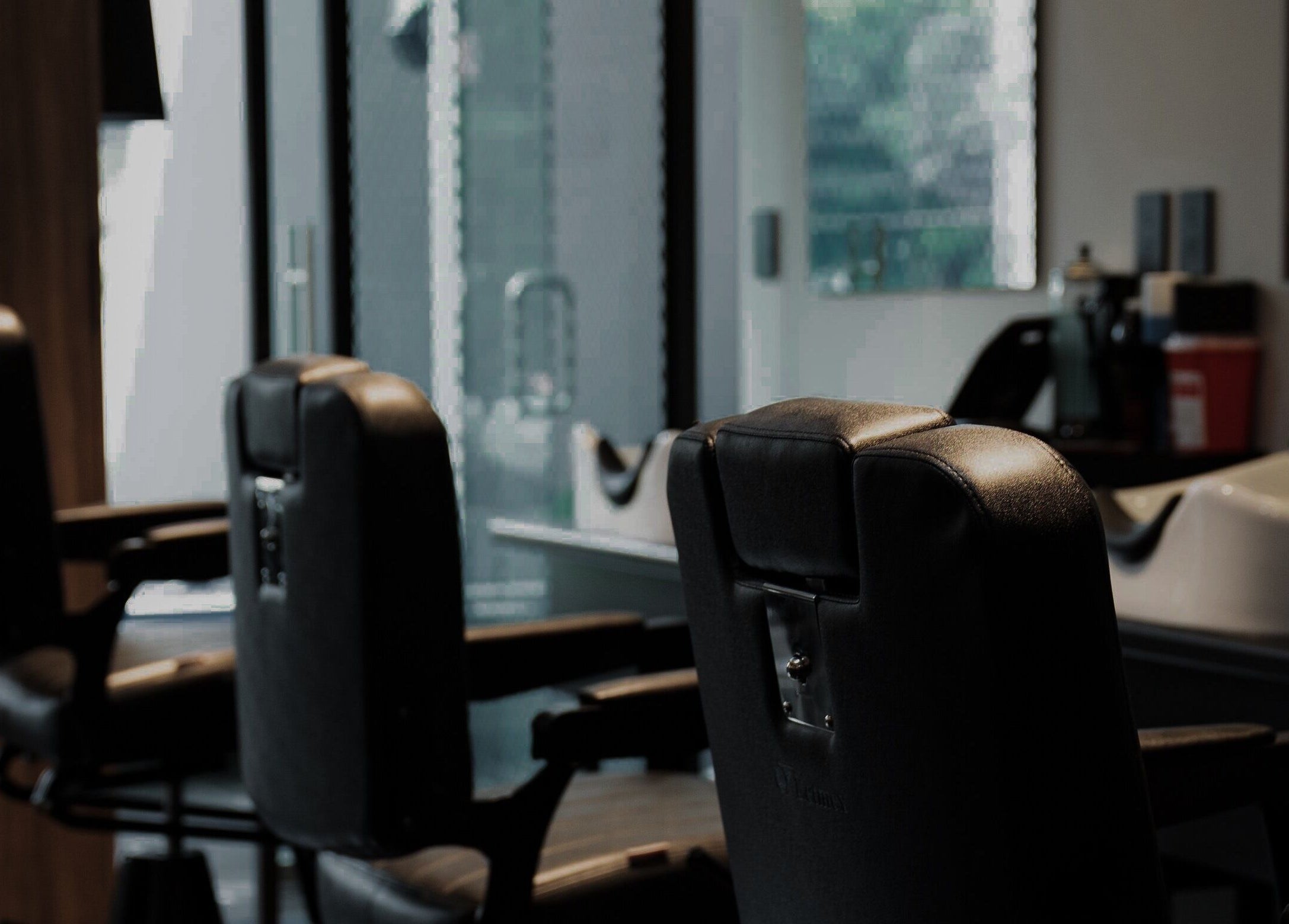 Sleek barber chairs at District Barber Society, Naucalpan De Juárez, Estado De México, MX.