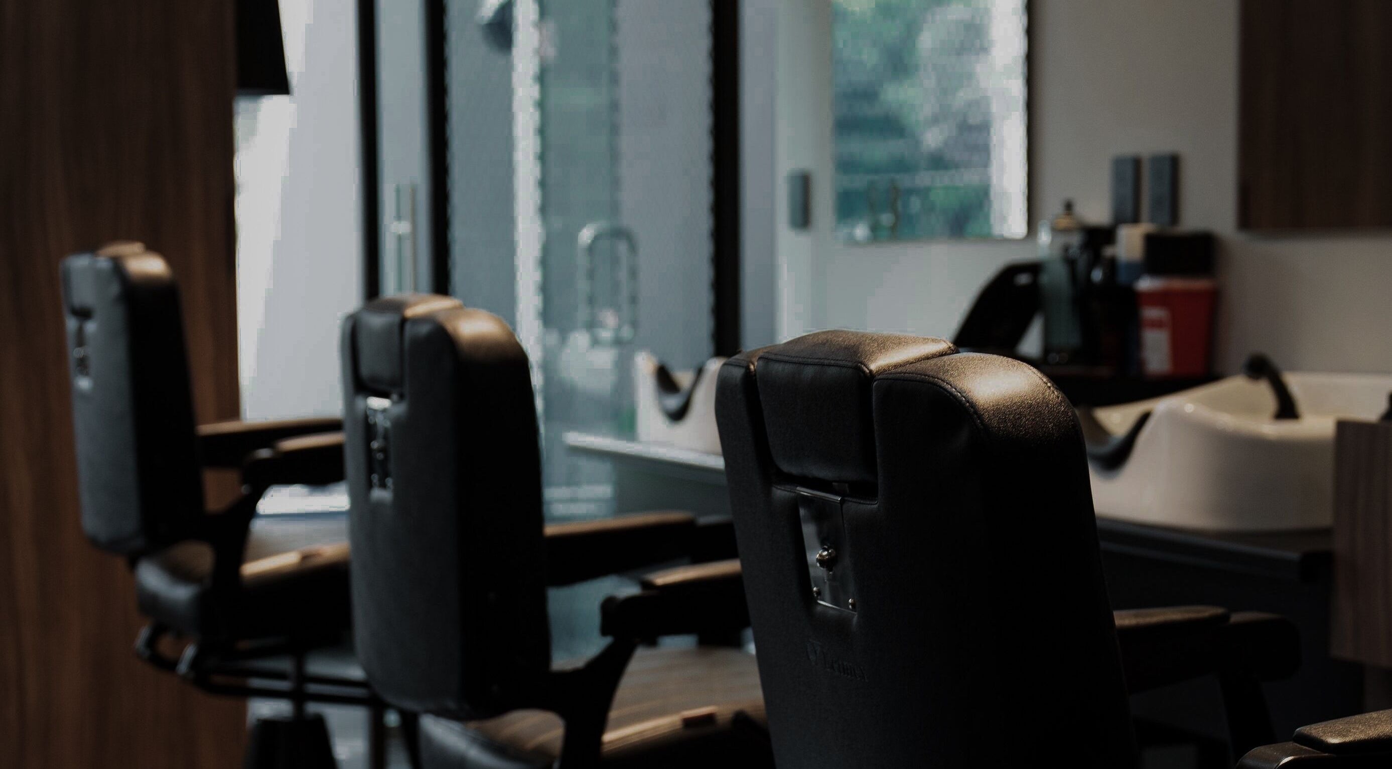 Sleek barber chairs at District Barber Society, Naucalpan De Juárez, Estado De México, MX.