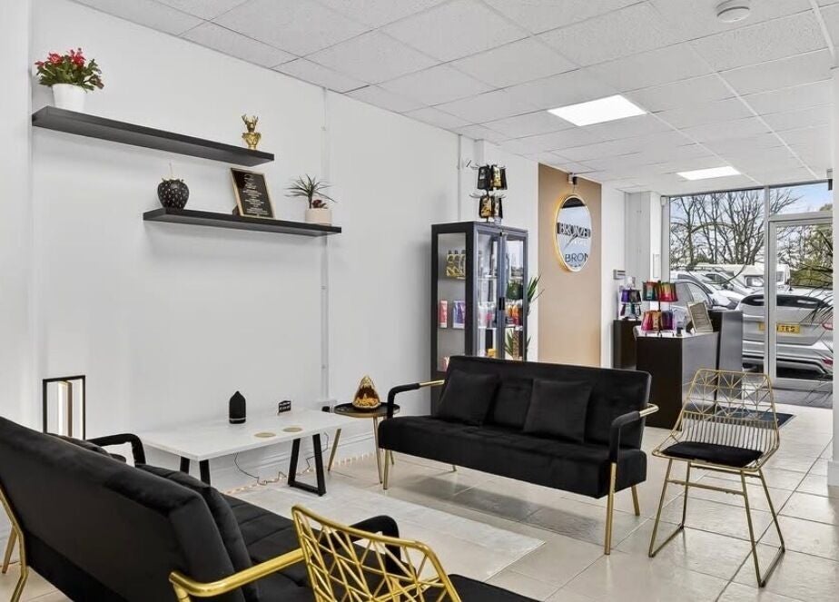 Elegant lounge area at Cknails, Plymouth, England, GB with modern decor and comfortable seating.