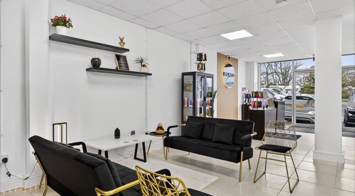 Elegant lounge area at Cknails, Plymouth, England, GB with modern decor and comfortable seating.