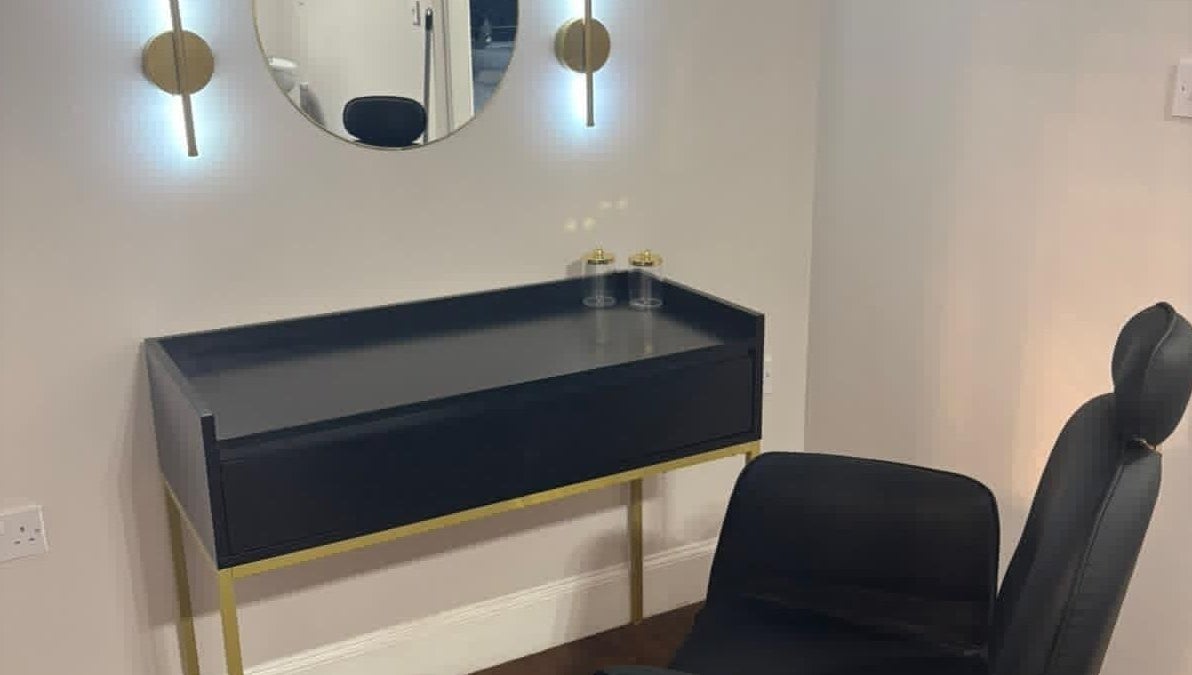 Chic makeup vanity setup at Chantelle Fairbairn Makeup Artistry, Camelon, Scotland, GB with stylish lighting.