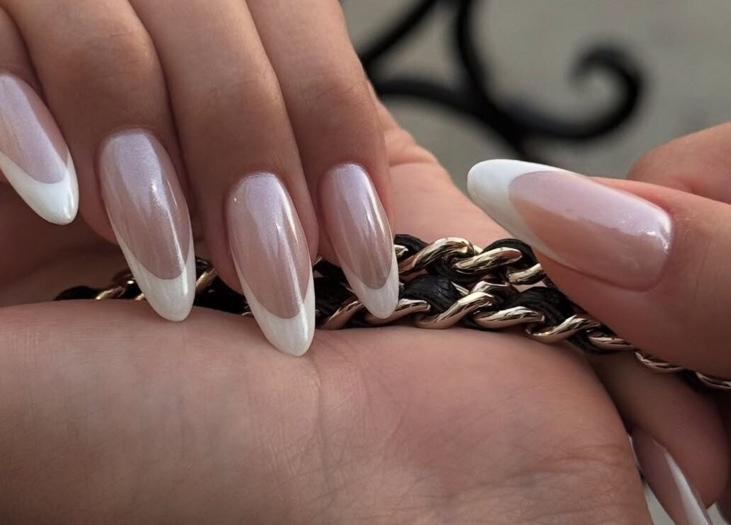 Elegant French manicure at Sole Beaut& Nail in Toronto, Ontario, CA showcasing refined nail artistry.