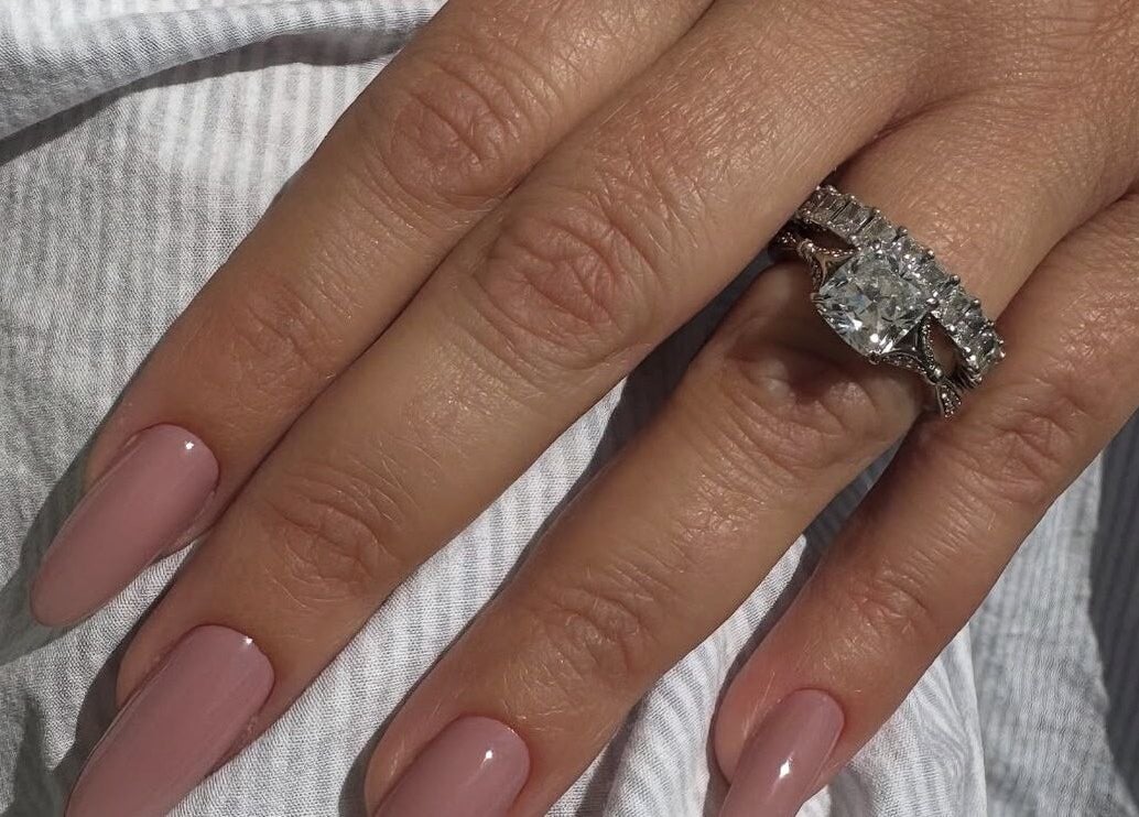 Elegant manicured nails with a diamond ring at Sole Beaut& Nail, Toronto, Ontario, CA.