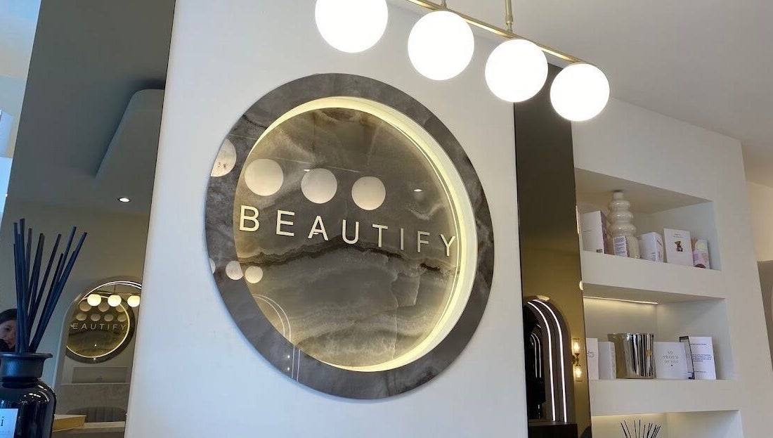 Elegant interior sign at Radiant Nails in Clayton-le-woods, England, GB, showcasing modern decor.
