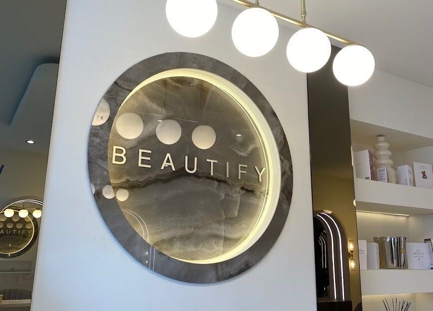 Elegant interior sign at Radiant Nails in Clayton-le-woods, England, GB, showcasing modern decor.