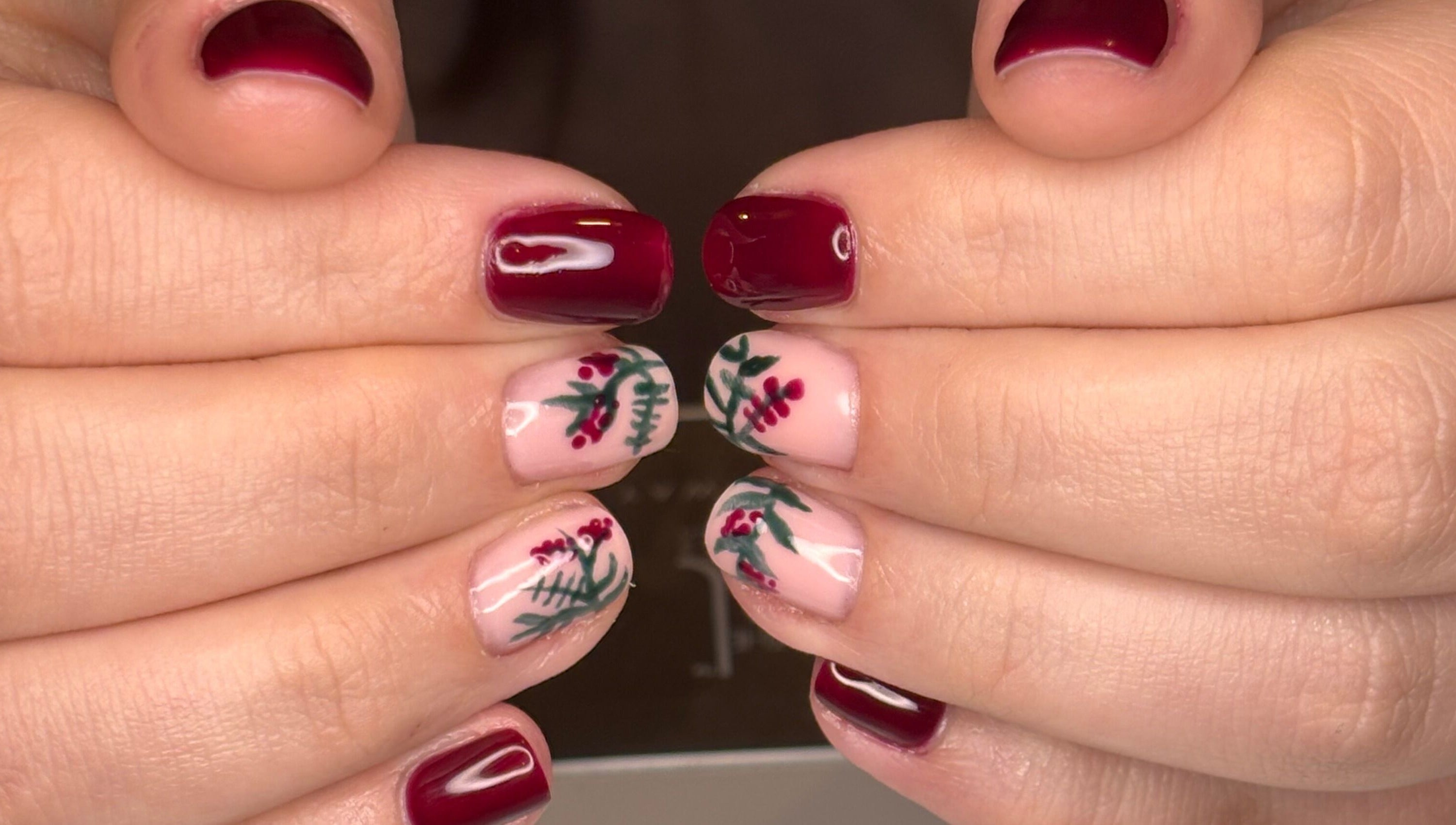 Elegant floral nail art by Radiant Nails Mobile, Penwortham, England, GB. Features deep red and intricate designs.