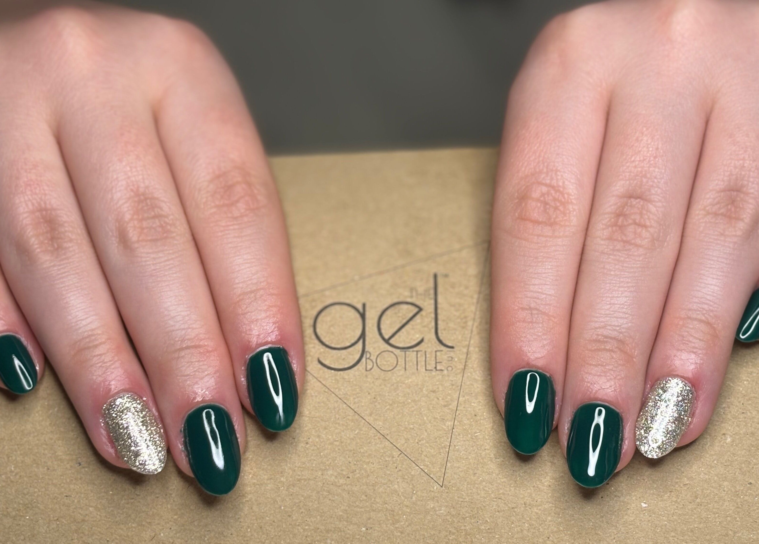 Stylish green nails with gold accent at Radiant Nails Mobile, Penwortham, England, GB.