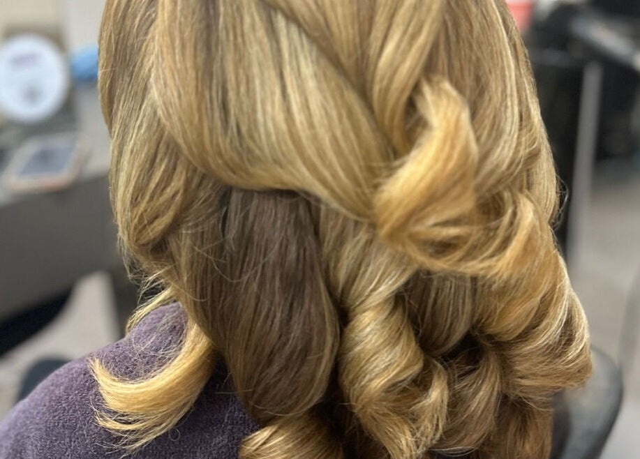 Stylish braid hairstyle at Hairbykatiejb.x in Chalfont Saint Peter, England, GB, showcasing expert hairstyling.