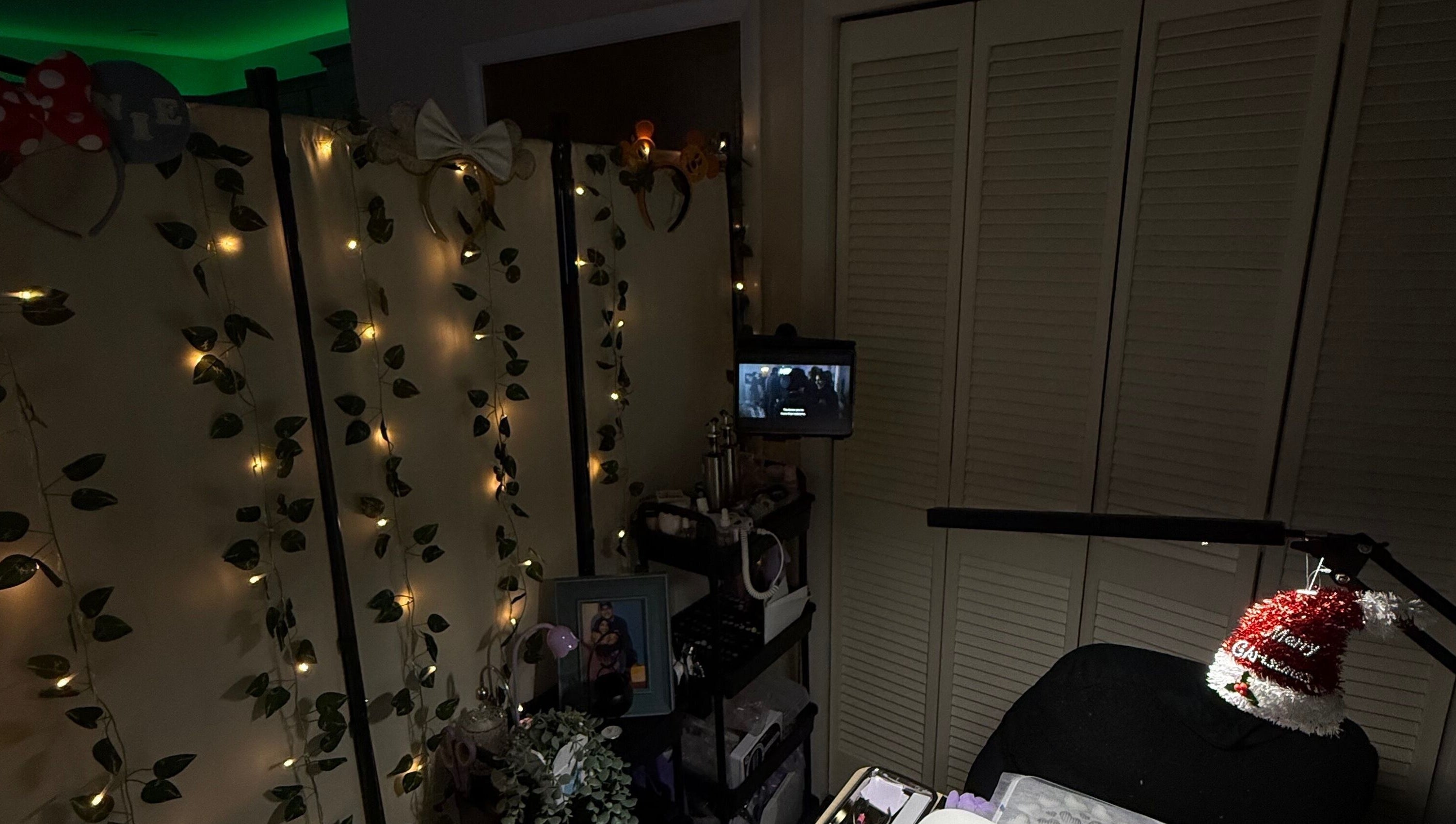 A cozy, softly lit beauty treatment space at Angelsdenn in Watertown, New York, US with decorative lights.