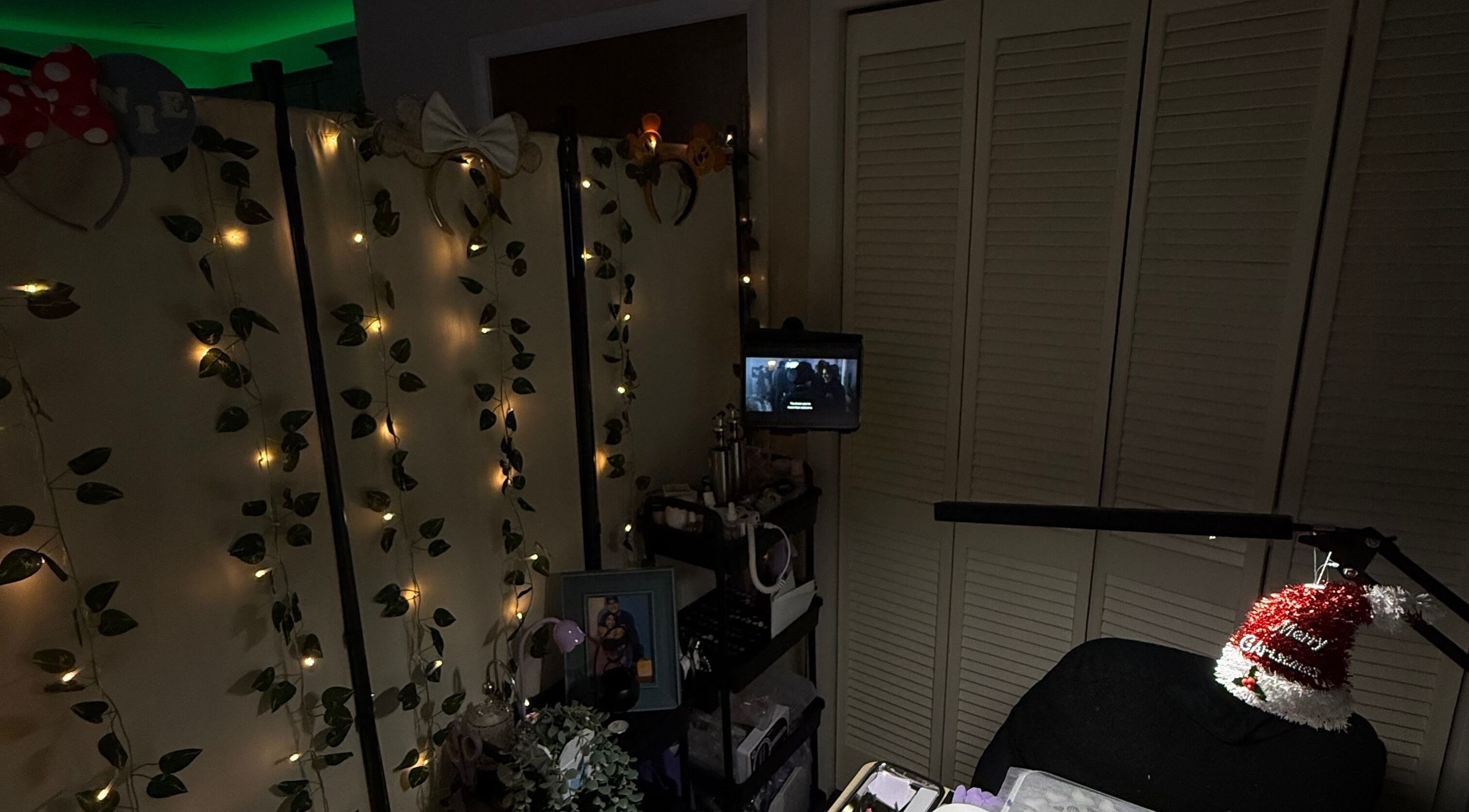 A cozy, softly lit beauty treatment space at Angelsdenn in Watertown, New York, US with decorative lights.