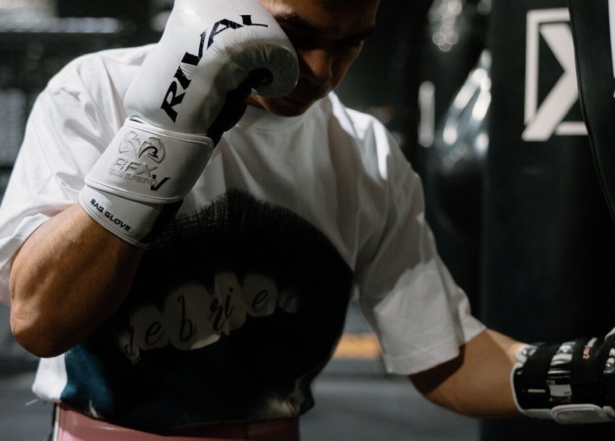 A person training with a punching bag at Team Igusti in Hindmarsh, South Australia, AU.