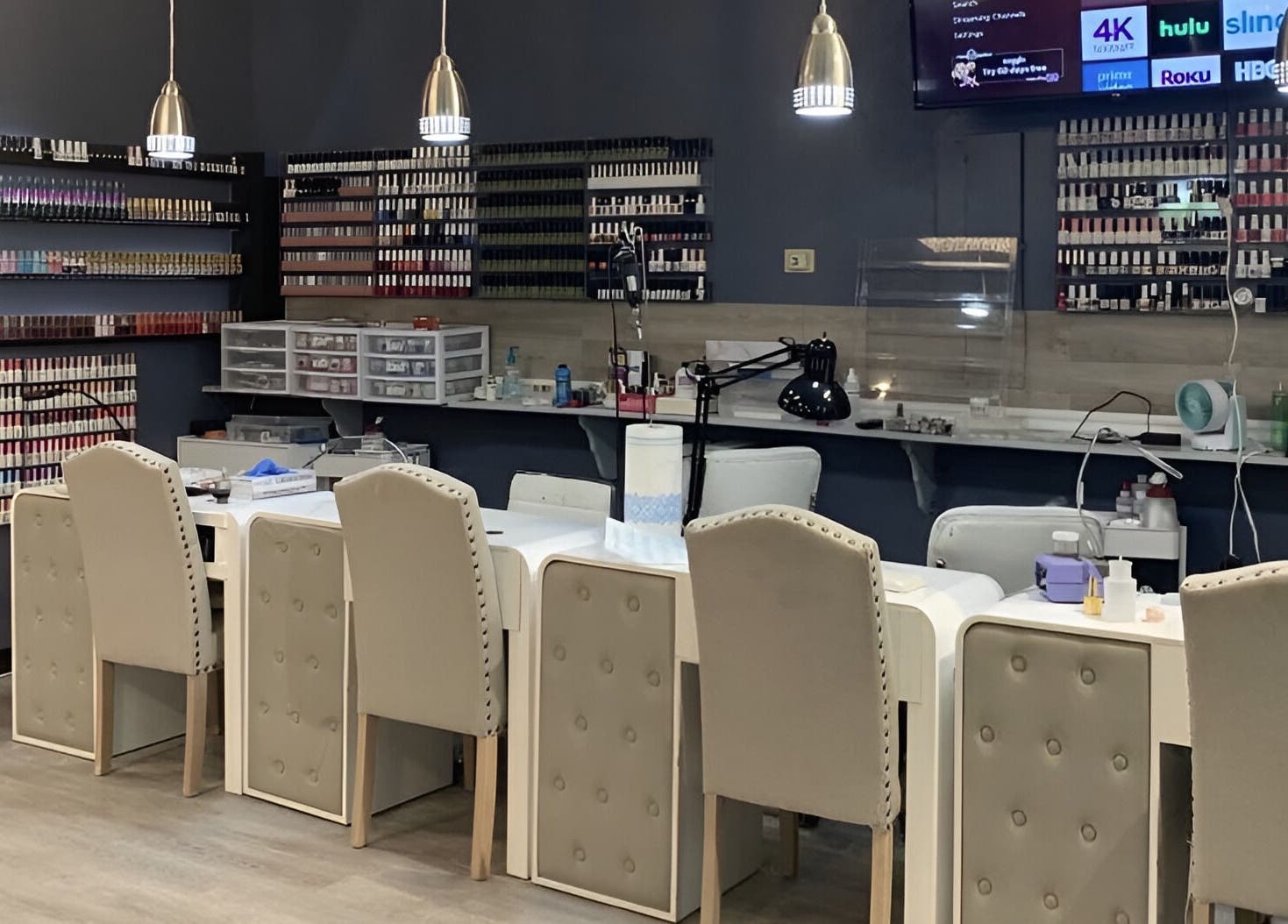 Elegant interior of Lys Nail Salon featuring manicure stations in Blackfoot, Idaho, US.
