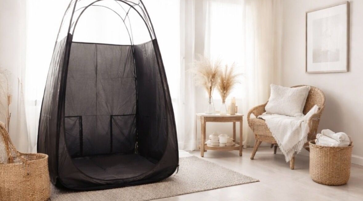 Cozy relaxation corner at Golden Edit, Surrey, British Columbia, CA with tanning tent and wicker chair.