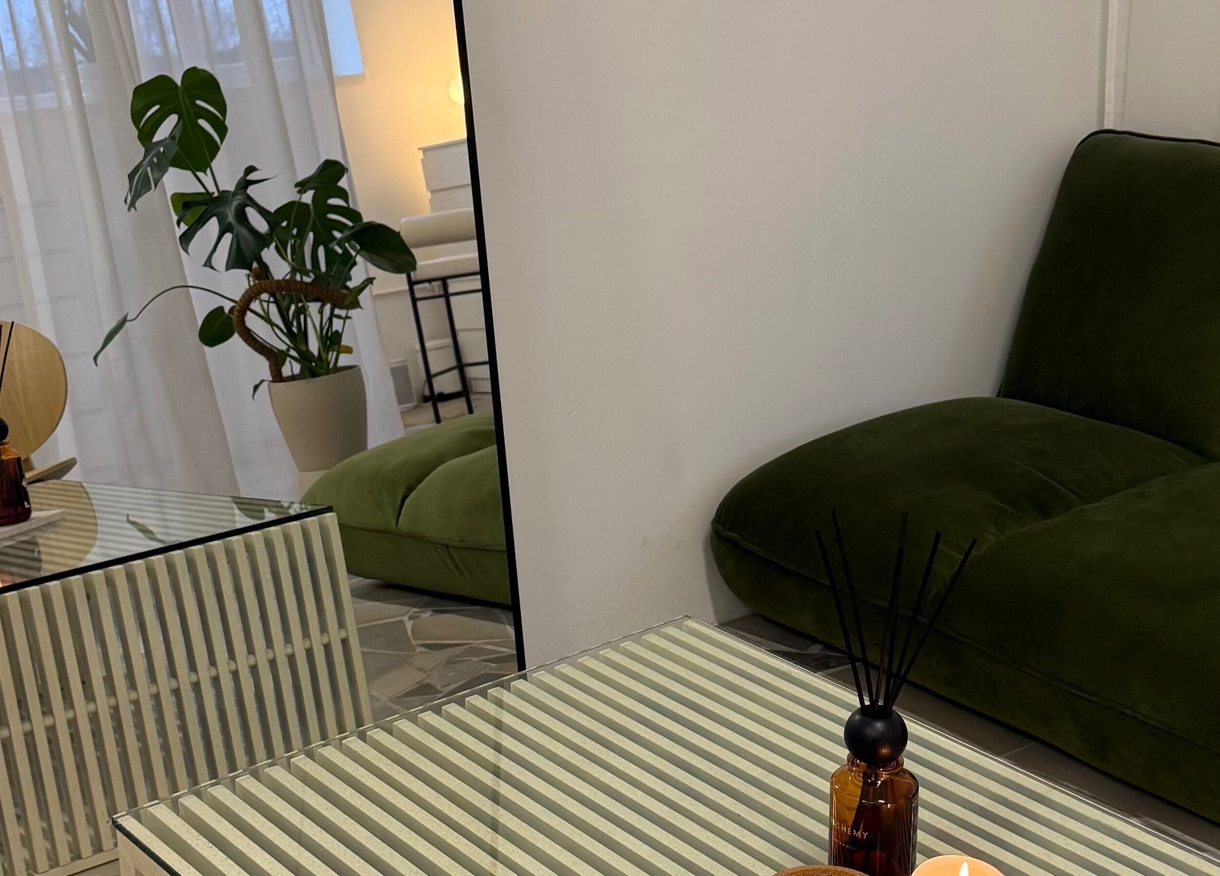 Relaxing lounge at Bymiaf, Salford, England, GB with green sofa and stylish decor.