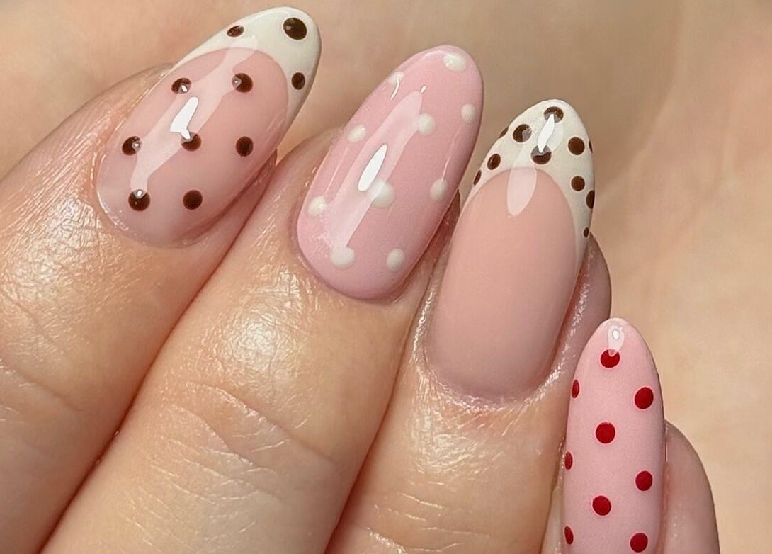 Elegant polka dot nail art by Bymiaf in Salford, England, GB showcasing intricate pink and brown designs.
