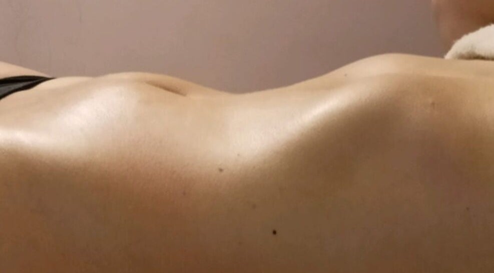 Relaxing massage at Healing Hands by Lisena LTD in London, England, GB, showcasing a tranquil back treatment.