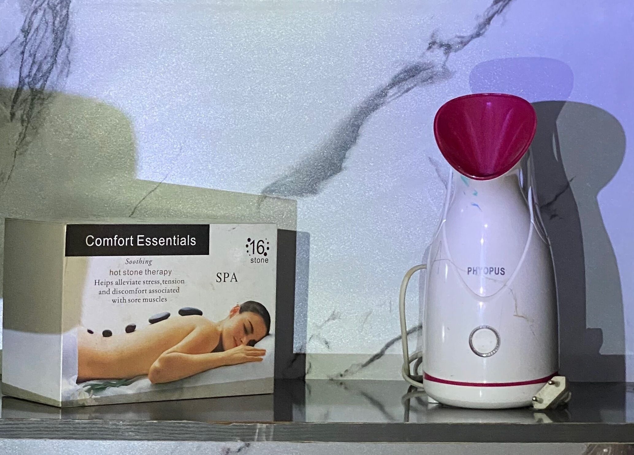Comfort Essentials and steamer on display at Emmabella Beauty Spa and Academy, Ilorin, NG.