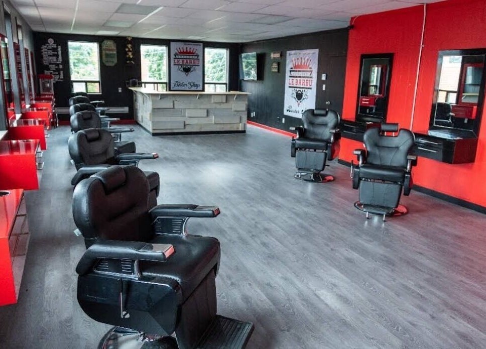 Stylish interior at Els The Hairstylist, Montréal, Québec, CA with red and black decor.