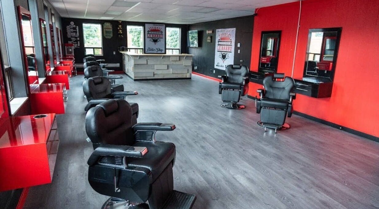Stylish interior at Els The Hairstylist, Montréal, Québec, CA with red and black decor.