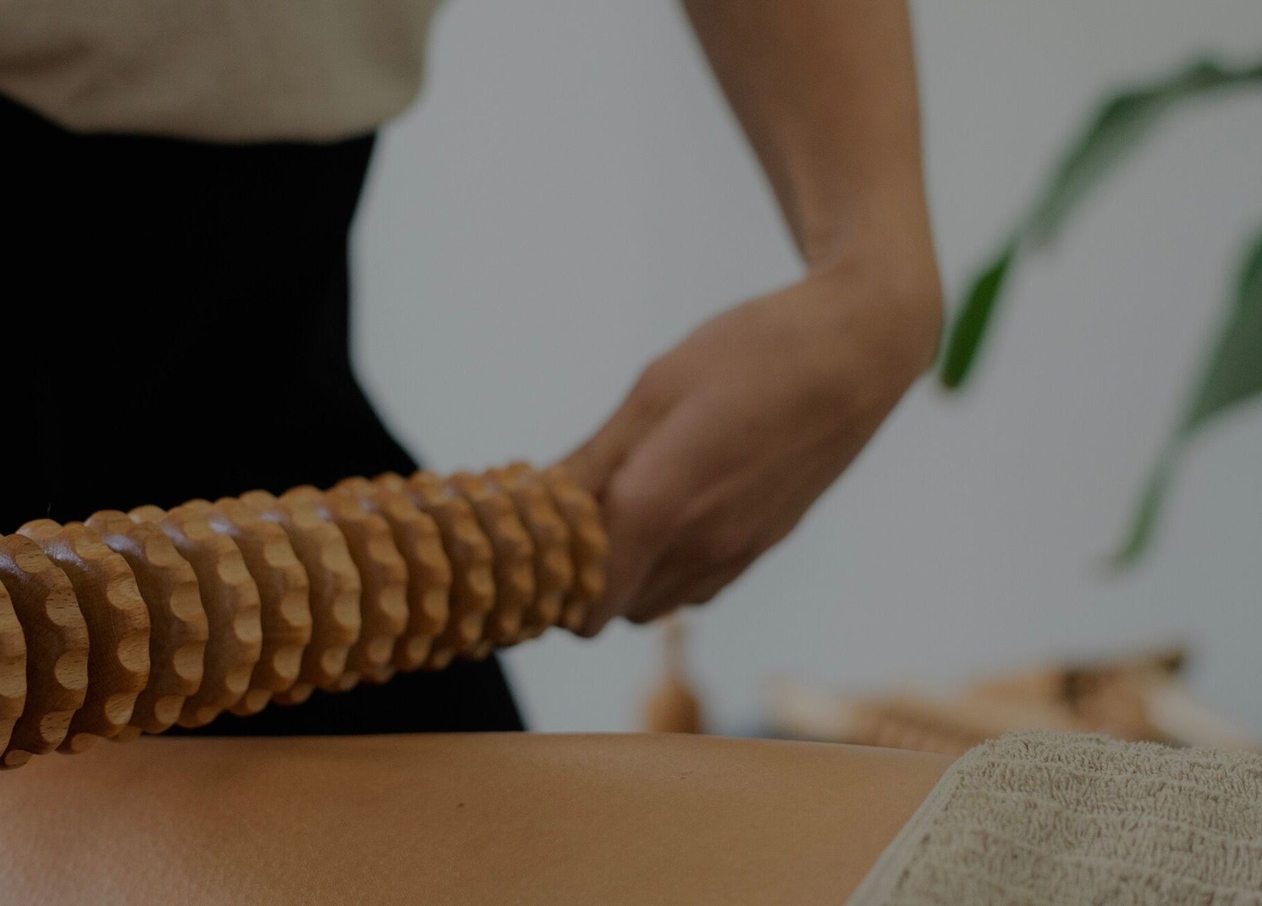Wooden massage tool used at She Studio in Berlin, Berlin, DE for a soothing body treatment.
