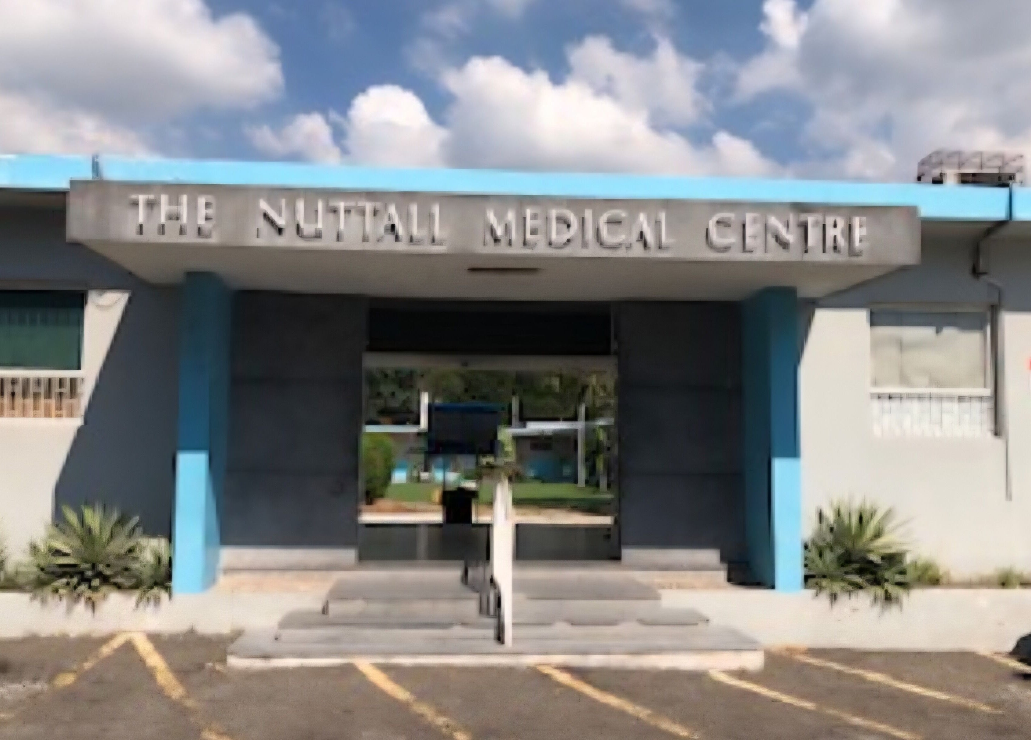 Entrance of Dr. Parsard Dermatology at Kingston, St. Andrew Parish, JM; modern architectural design.