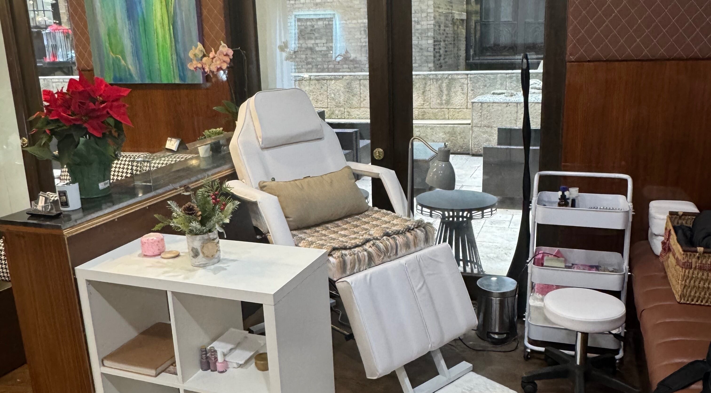 Relaxing nail spa chair at Amour Nails Midtown, New York, New York, US with elegant decor and cozy setup.