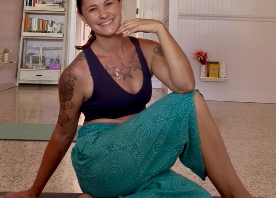 Person in yoga pose at SoulVival Wellness, Merritt Island, Florida, US, showcasing calm and relaxation.