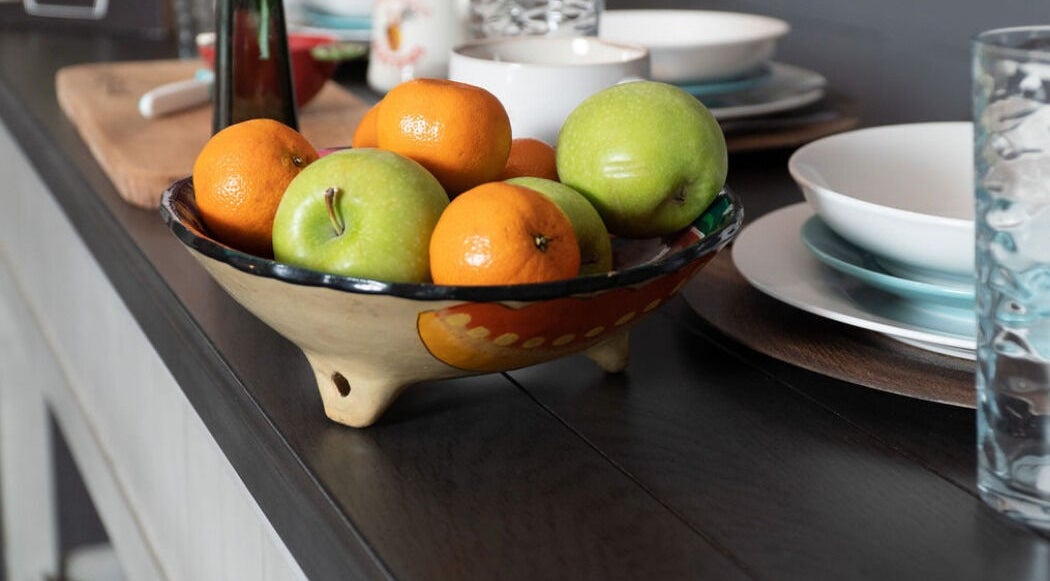 Vibrant fruit bowl on table at SoulVival Wellness in Merritt Island, Florida, US.
