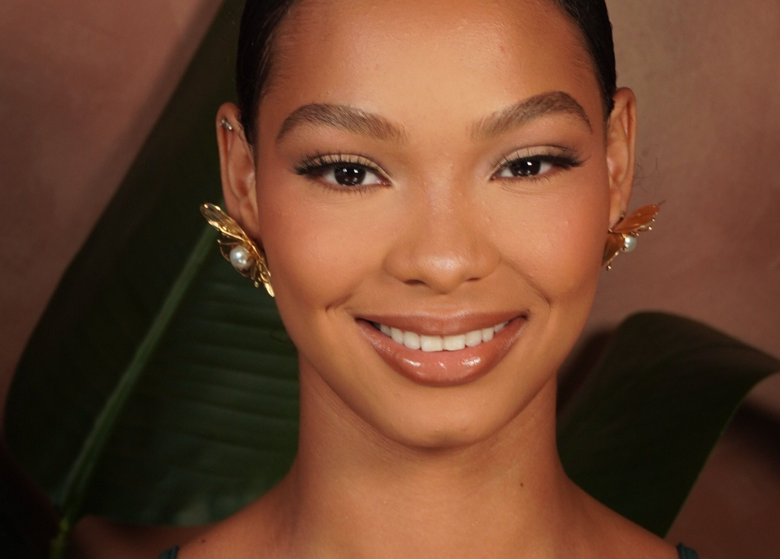 Close-up of a smiling woman with elegant makeup at Mykl Hues, Saint Augustine, Tunapuna/piarco Regional Corporation, TT.