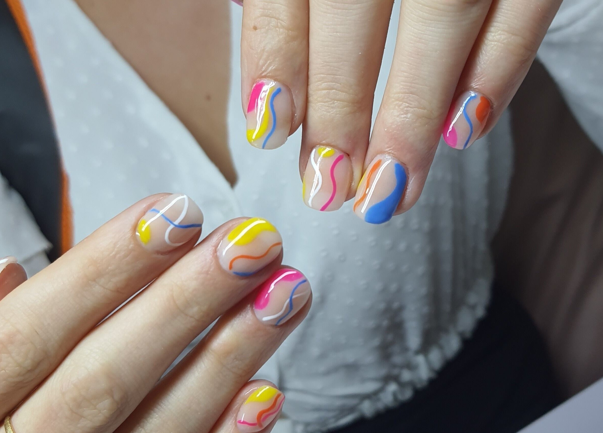 Colorful nail art at Melanies Studio, Paramaribo, Paramaribo, SR showcasing skilled manicure design.