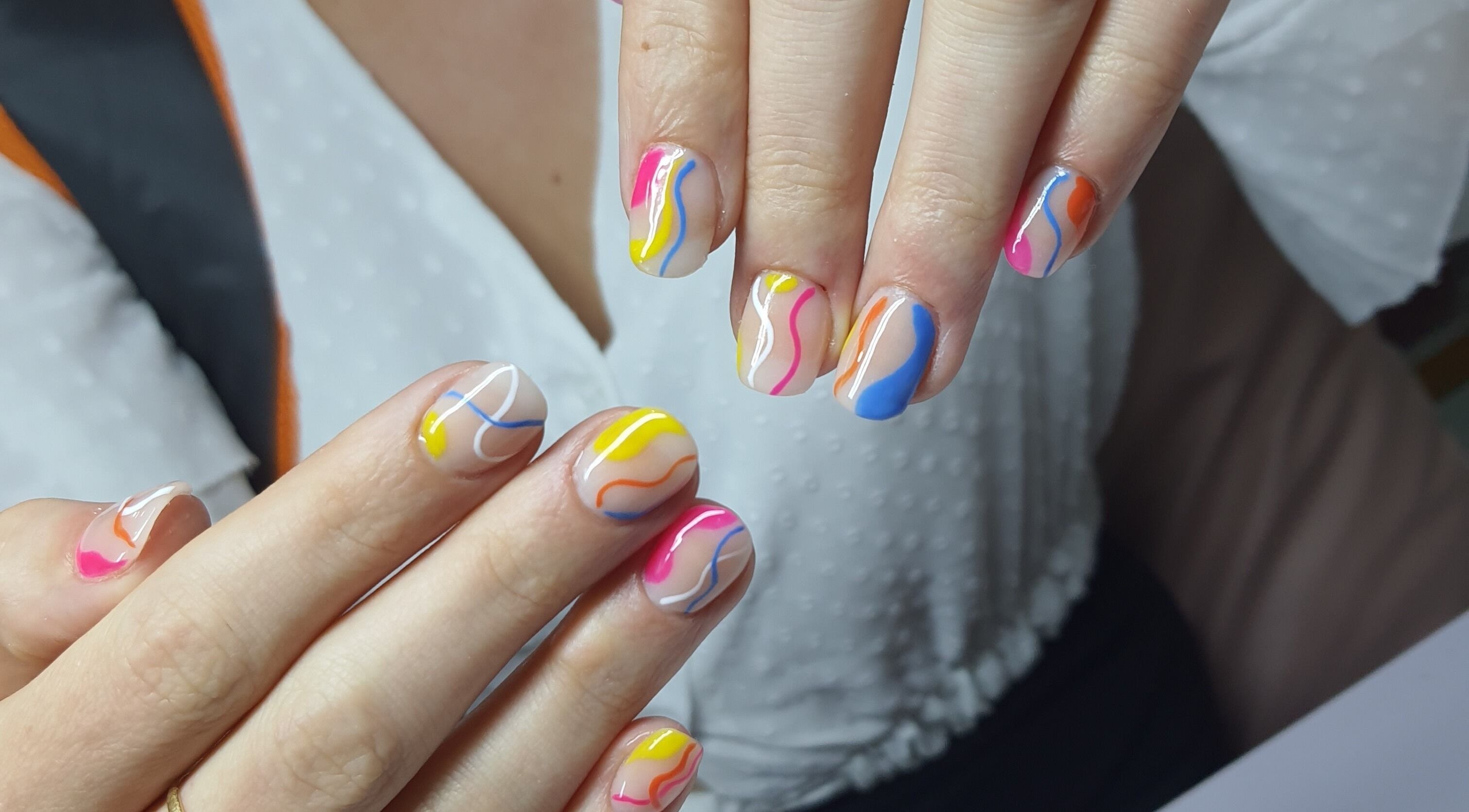 Colorful nail art at Melanies Studio, Paramaribo, Paramaribo, SR showcasing skilled manicure design.