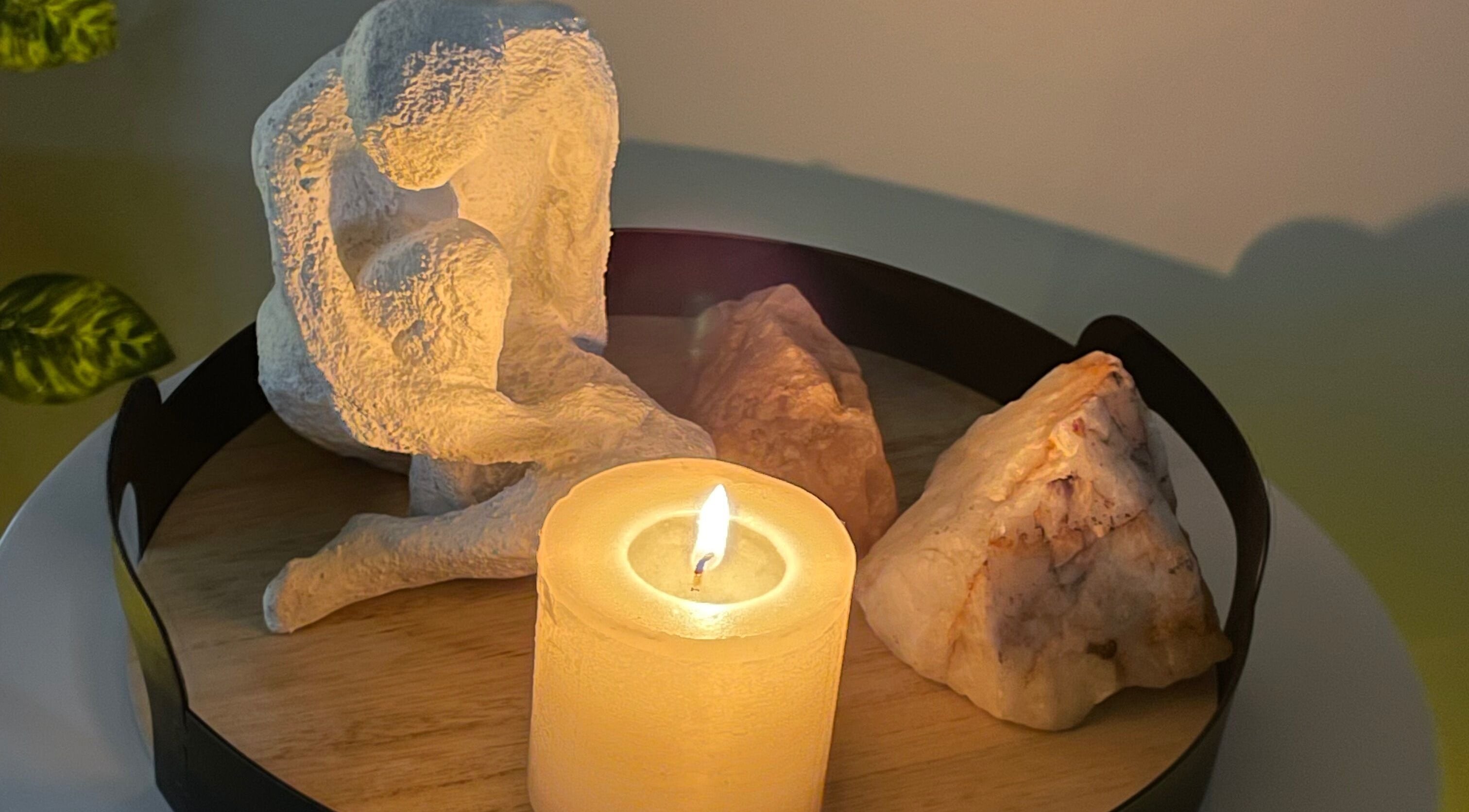 Tranquil candle and sculpture setting at Wellness Empowerment Bridge Spa, Kimberley, Northern Cape, ZA.