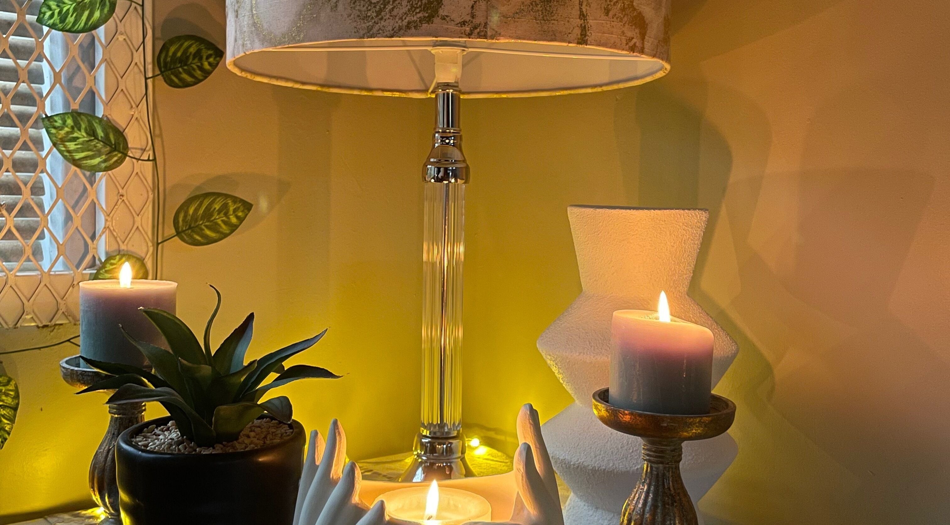 A tranquil candle-lit setup at Wellness Empowerment Bridge Spa in Kimberley, Northern Cape, ZA.