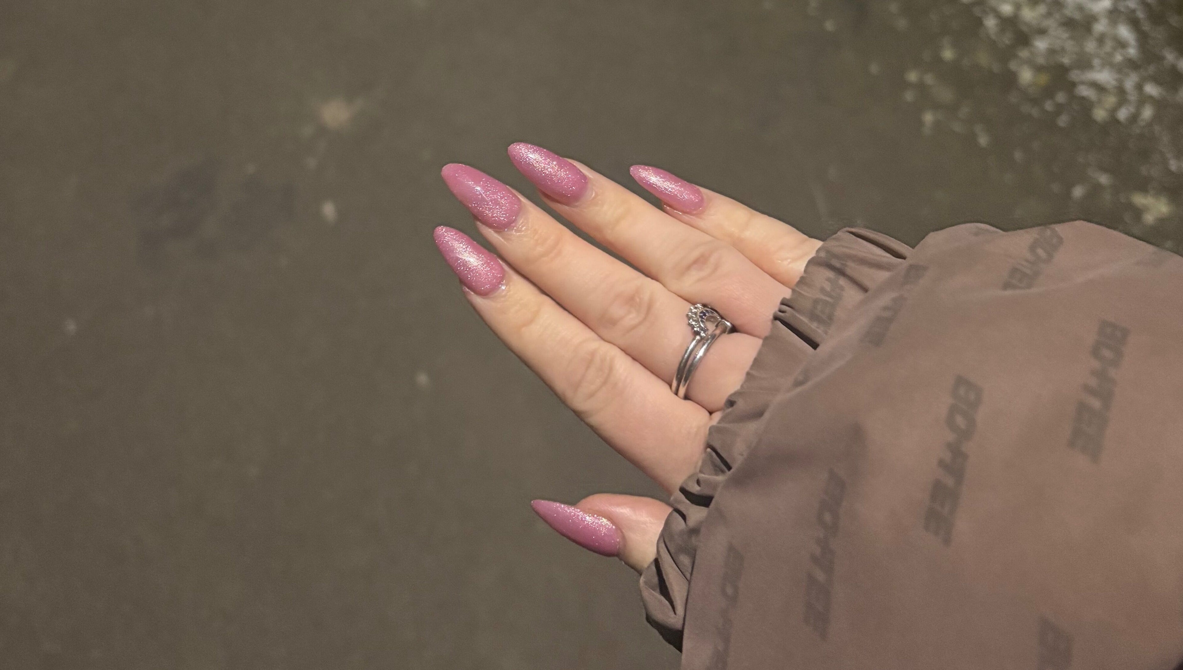 Sparkling pink nails at Bambas beauty room in Wallsend, England, GB.