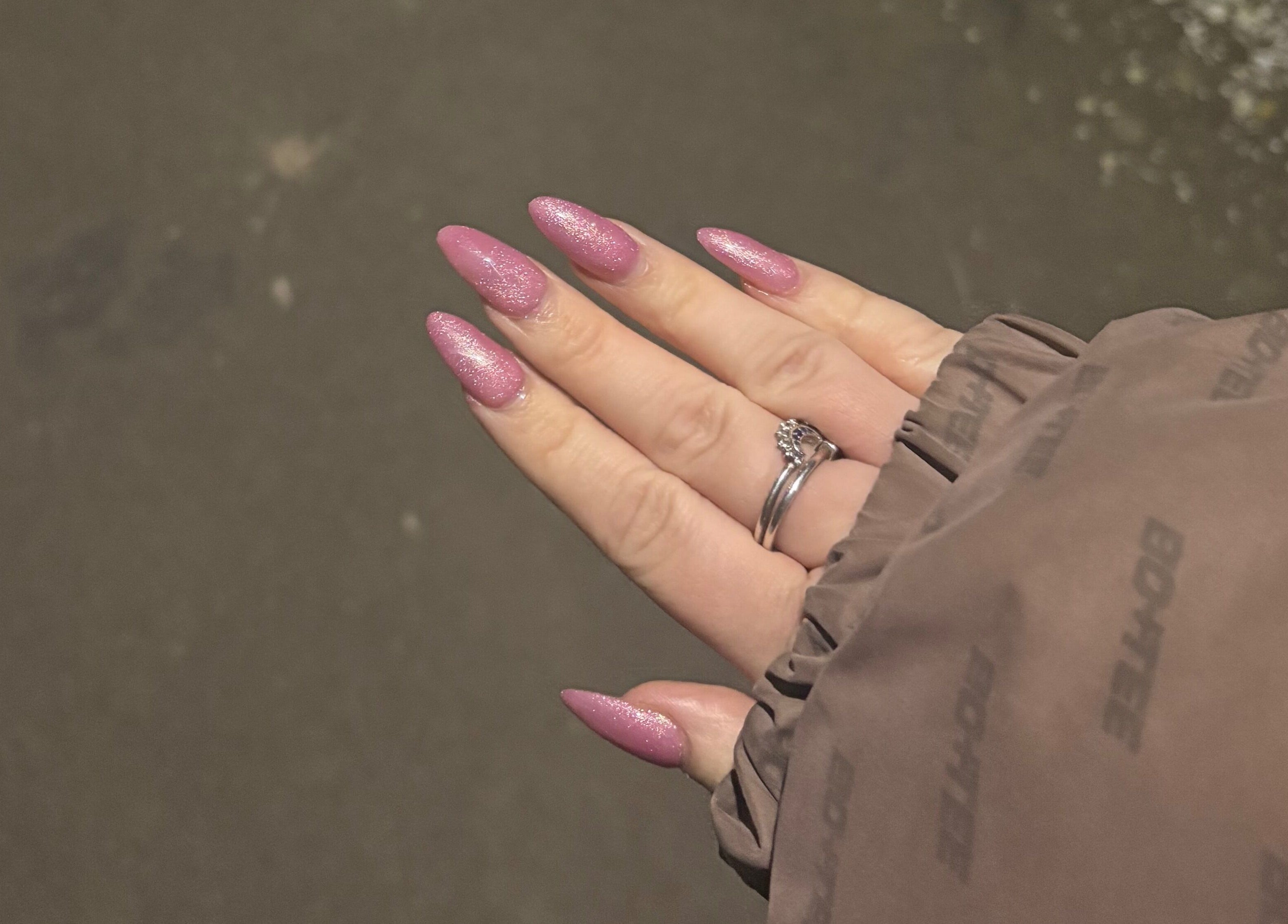 Sparkling pink nails at Bambas beauty room in Wallsend, England, GB.