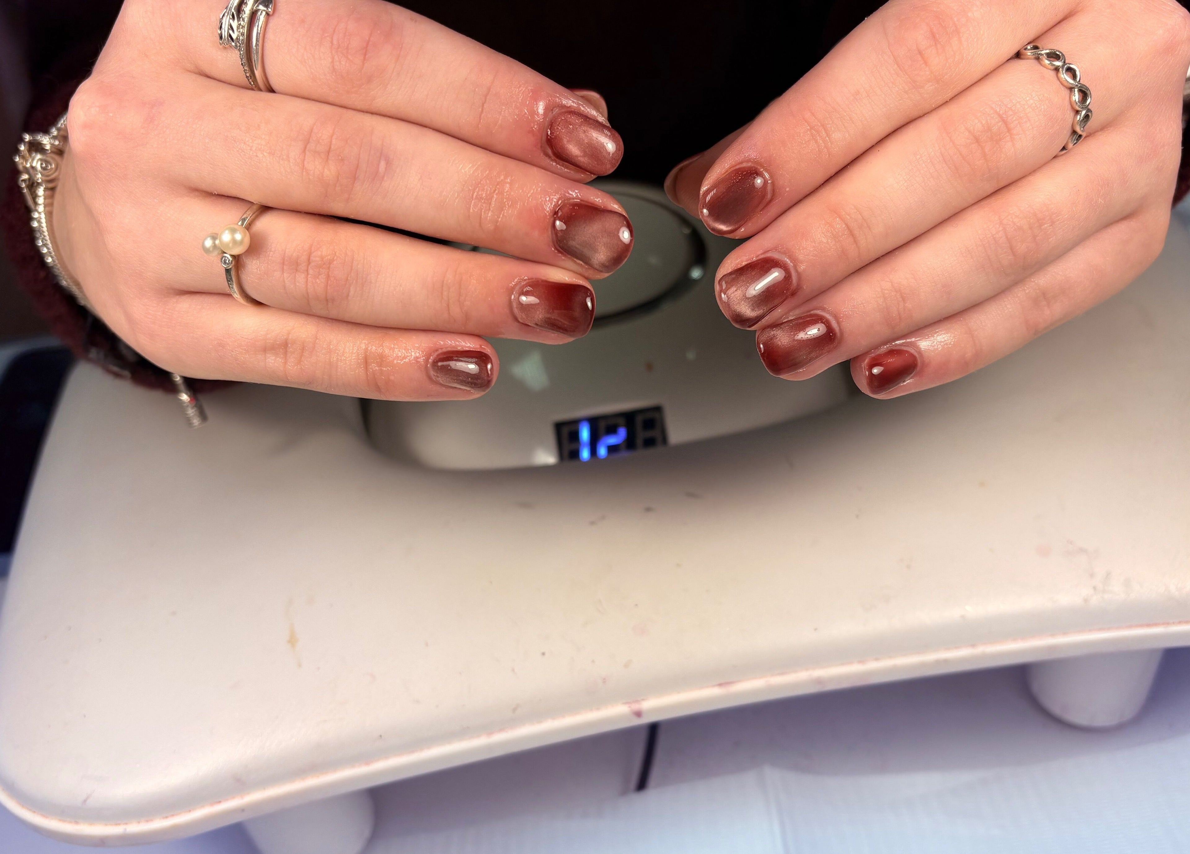 Elegant nail art with brown shades at Bambas beauty room, Wallsend, England, GB.