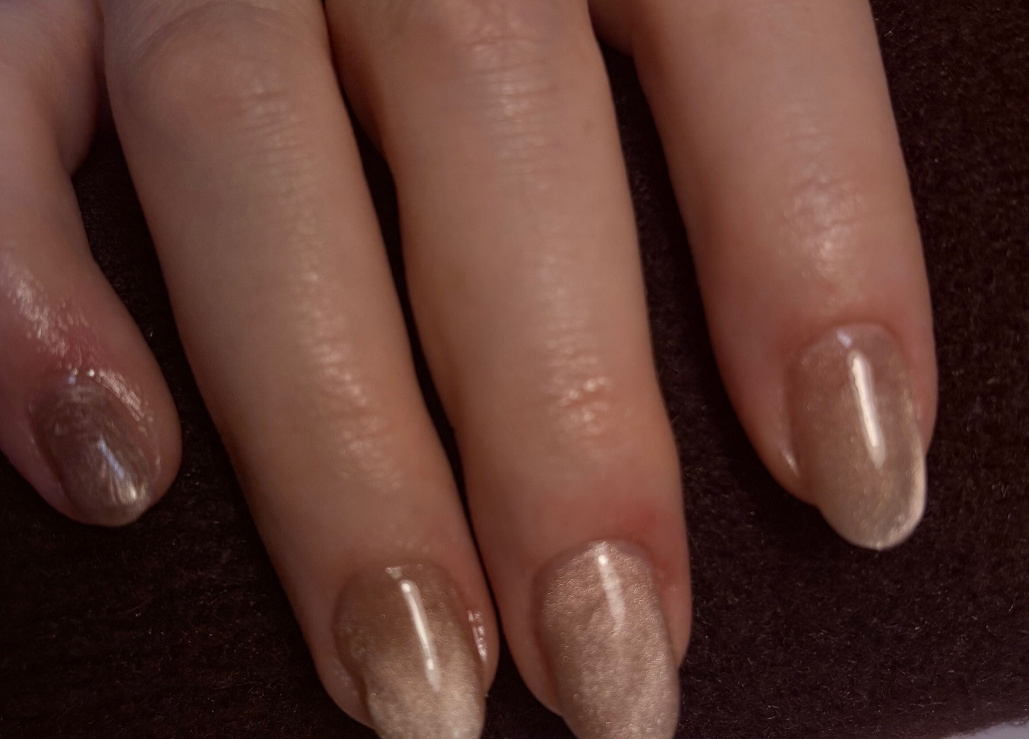 Elegant, shimmering nails at Bambas beauty room in Wallsend, England, GB showcasing expert manicure.