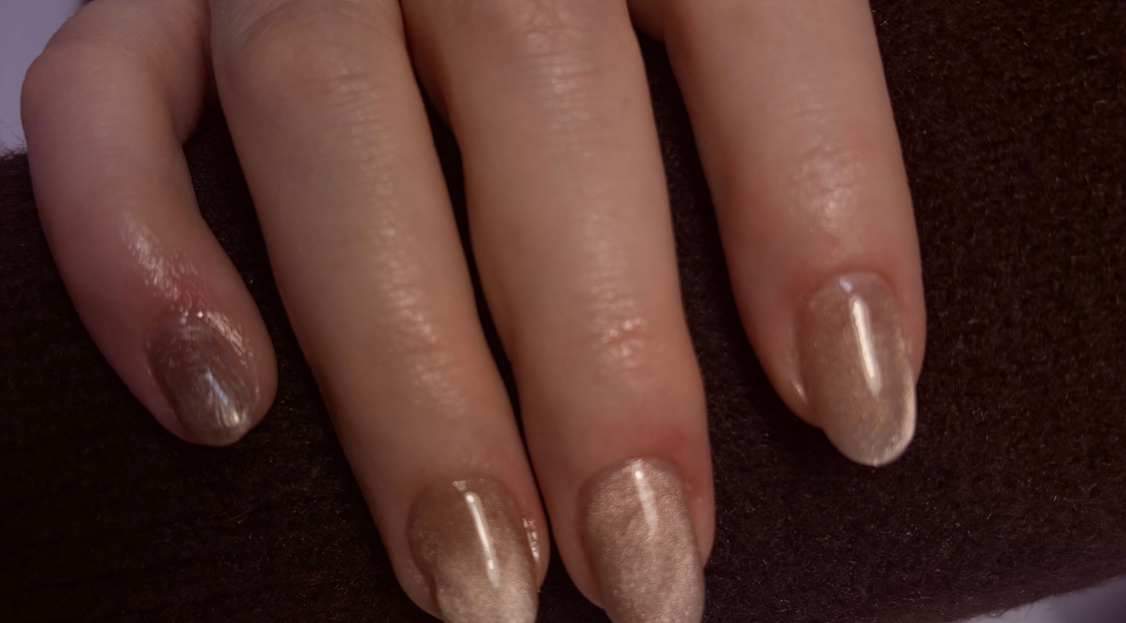 Elegant, shimmering nails at Bambas beauty room in Wallsend, England, GB showcasing expert manicure.