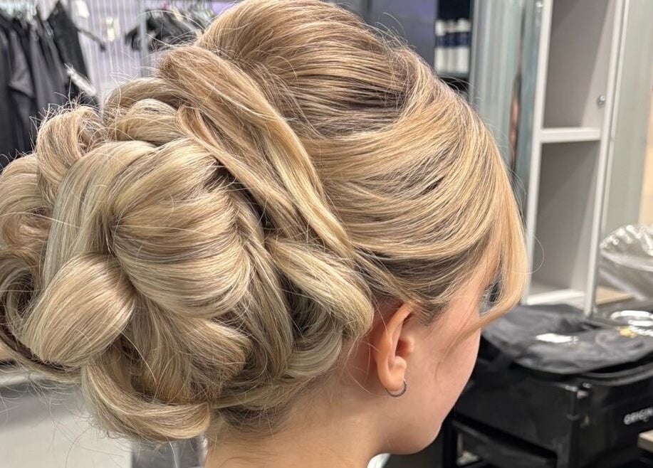 Intricate blonde updo at kaileigh-Jane Gray hair in Falkirk, Scotland, GB. Perfect for special occasions.