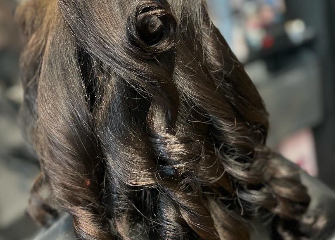 Elegant dark curls styled at kaileigh-Jane Gray hair, Falkirk, Scotland, GB.