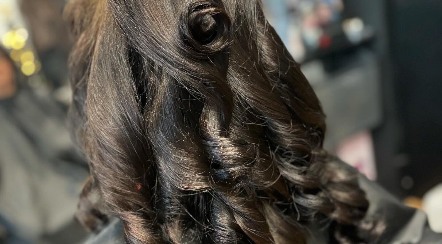 Elegant dark curls styled at kaileigh-Jane Gray hair, Falkirk, Scotland, GB.