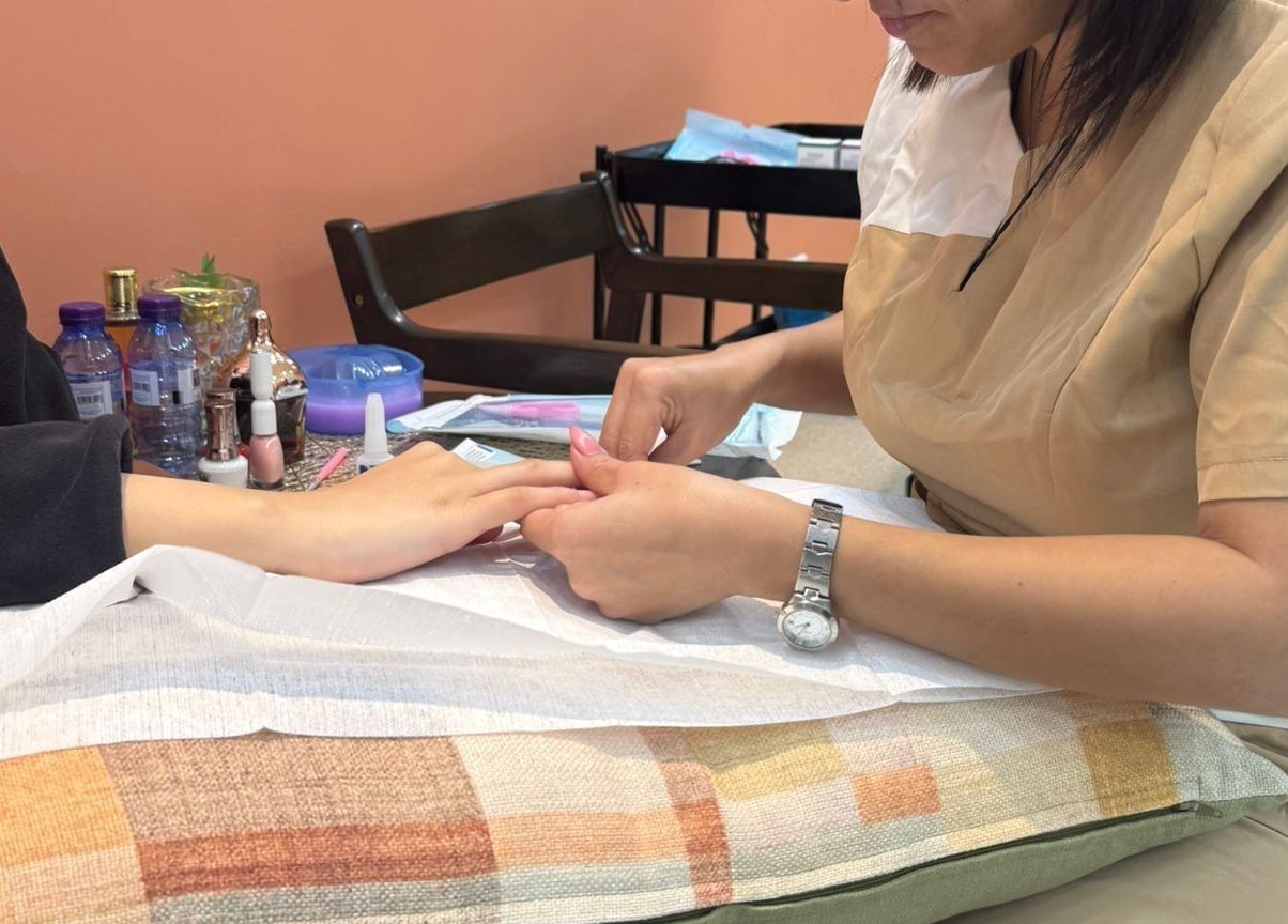 Manicure service at Remal Beauty Salon, Zinj, Muḥāfaẓat Al-ʿāṣimah, BH.
